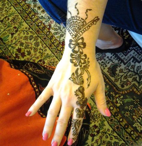 Here's my hand.  Check out that henna, again, by Henna Designers.  Oh, and my lovely manicure.  Did I ever mention that my friend, Michelle, is also my nail tech here in the sand?  